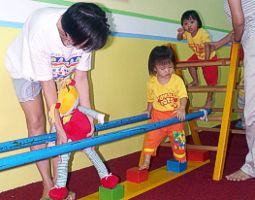 Robyn overcoming obtsacles at Tumble Tots
