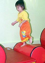 Robyn overcoming obtsacles at Tumble Tots