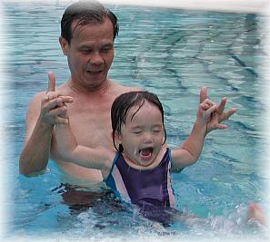 Grandpa and Robyn in the pool
