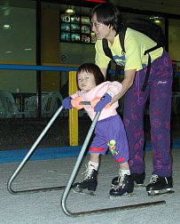 Robyn and Jin on skates