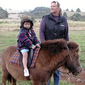 Robyn's first time riding a pony