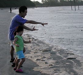 Robyn and Daddy harnessing the power of the waves
