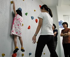 Robyn demonstrating climbing grace and balance