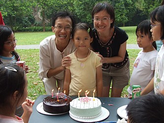 Alvin and Jin celebrating Robyn's 8th birthday