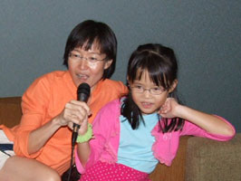 Jin and Robyn singing karakoe