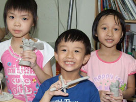 Kids enjoying paperclay creations