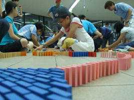 Robyn supporting a team in the domino game