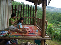 Jin and Robyn at the balcony of Tigerland Rice Farm Lodge