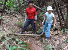 Father Gun and Robyn at the start of the dam construction