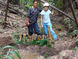 Mother Tomei and Robyn at the completed dam