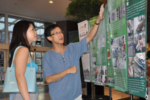 Alvin explaining the creation process to Geneviene