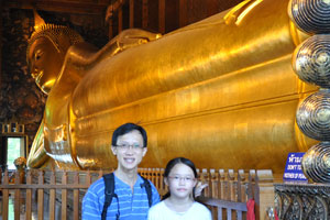 Alvin and Robyn at the feet of the reclining buddha