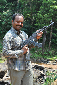 Praveen with AK-47