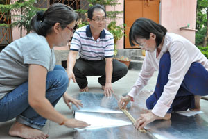 Solar engineers at work... DIY solar cooker.
