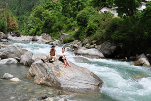 Hari and Robyn at the Tirthan River