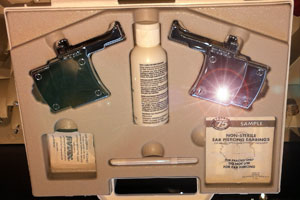 Ear piercing gun