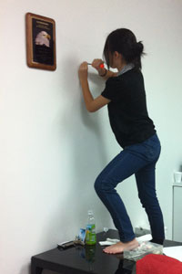 Robyn putting in another nail