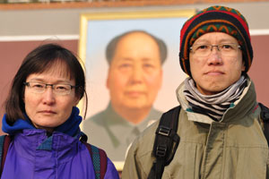 Three serious faces at the Forbidden City.