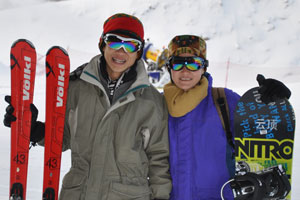 Alvin on ski and Jin on snowboard