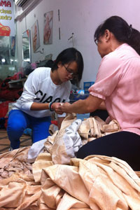 Robyn helping out at Mama Dryclean