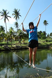 Robyn doing the postman walk over the pond