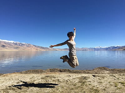 

A perfect shot of an airborne Yijun at TsoMoriri against a cloudless blue sky.